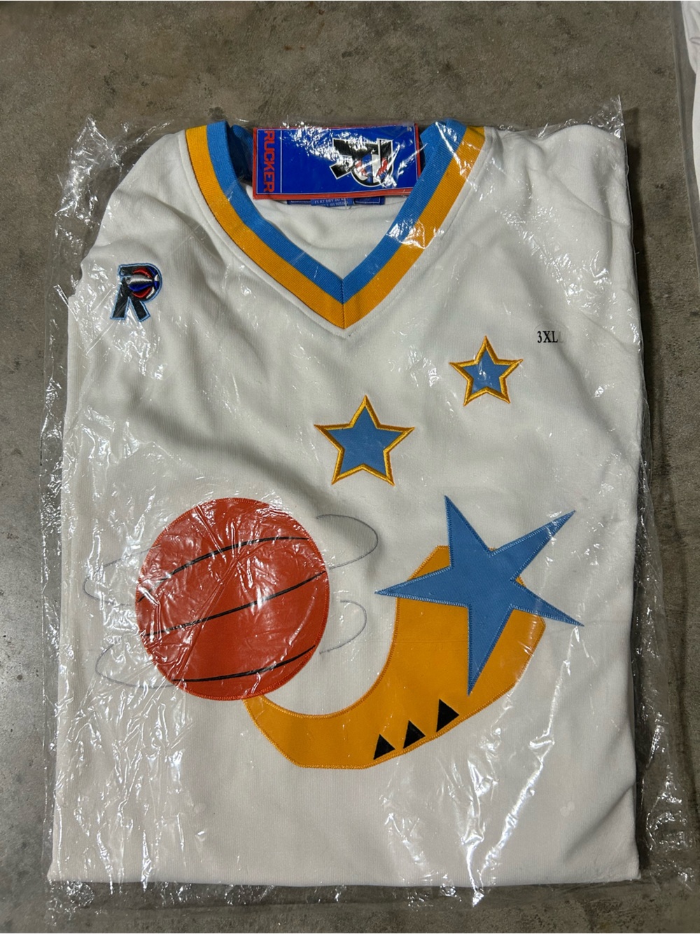 New with tags Rucker basketball jersey in original sealed packaging.